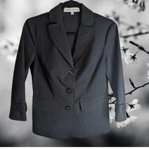 Donna Degnan 6 long sleeve button front black woman's acetate blazer.
